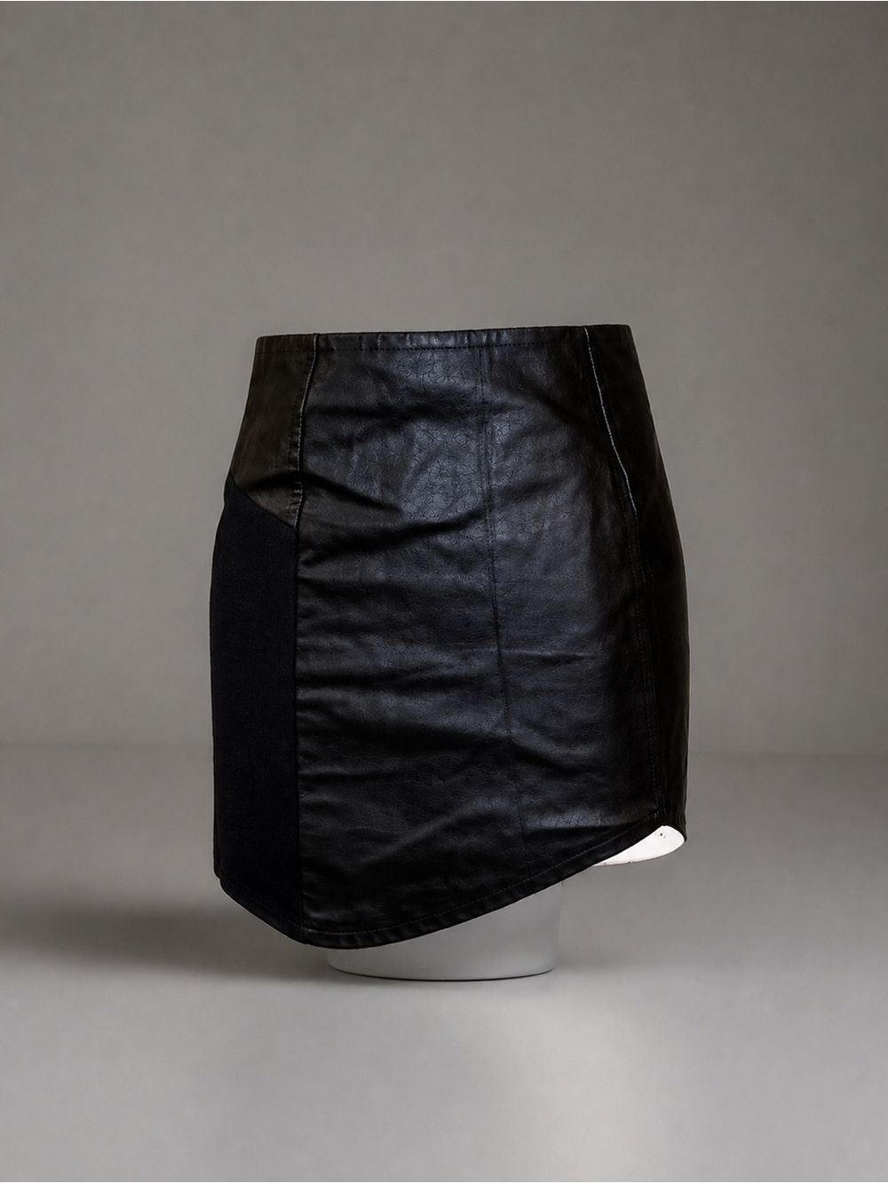 Bebe Small Black Mixed media Short Bodycon Mini Skirt. Asymmetrical hem